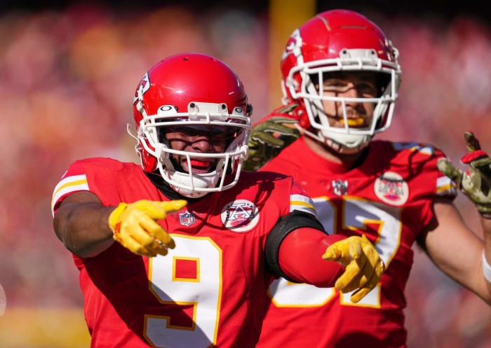 Nov 13, 2022; Kansas City, Missouri, USA; Kansas City Chiefs wide receiver JuJu Smith-Schuster (9) celebrates alongside tight end Travis Kelce (87) during the first half against the Jacksonville Jaguars at GEHA Field at Arrowhead Stadium. Mandatory Credit: Jay Biggerstaff-USA TODAY Sports